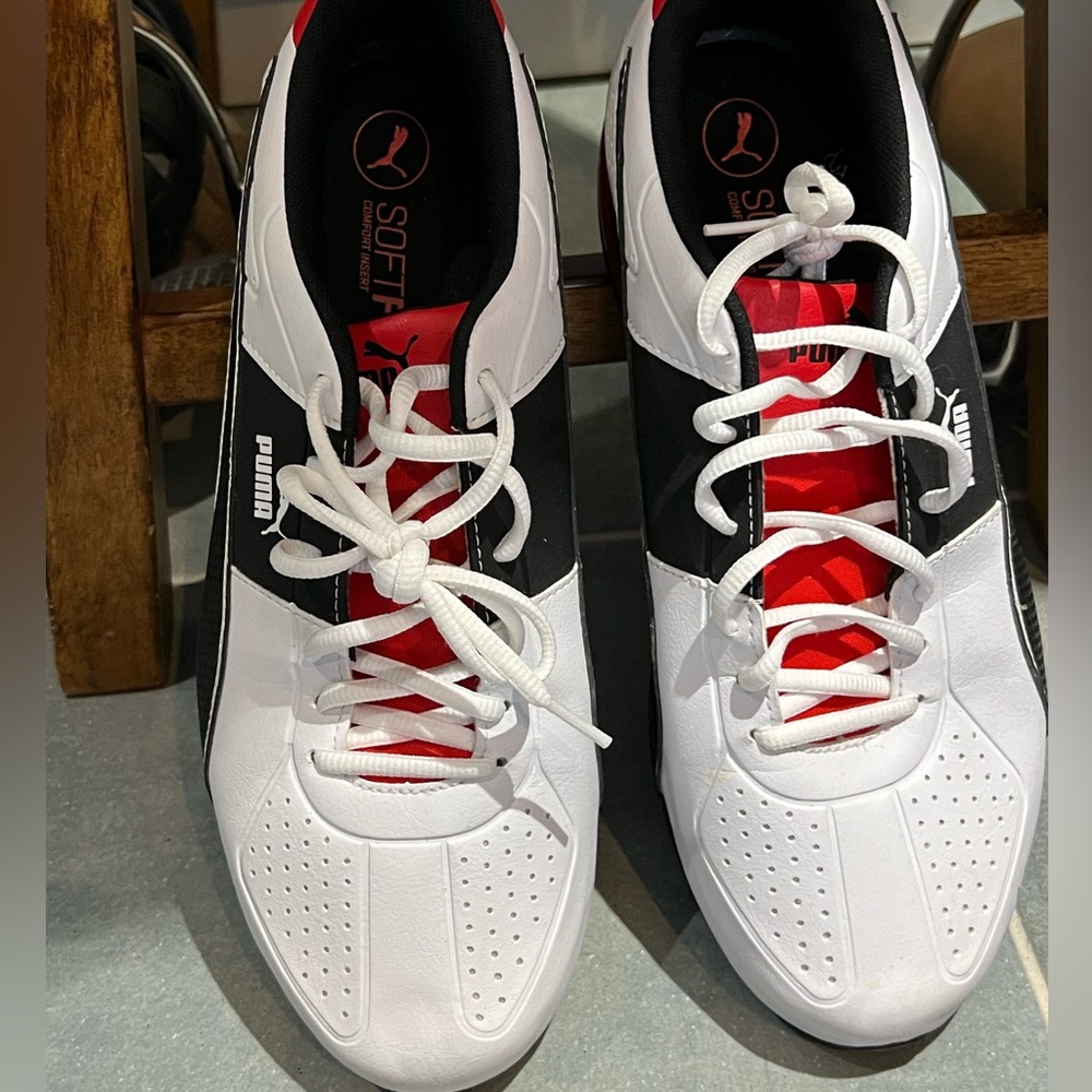 Size 11 white shoes with red worn 2